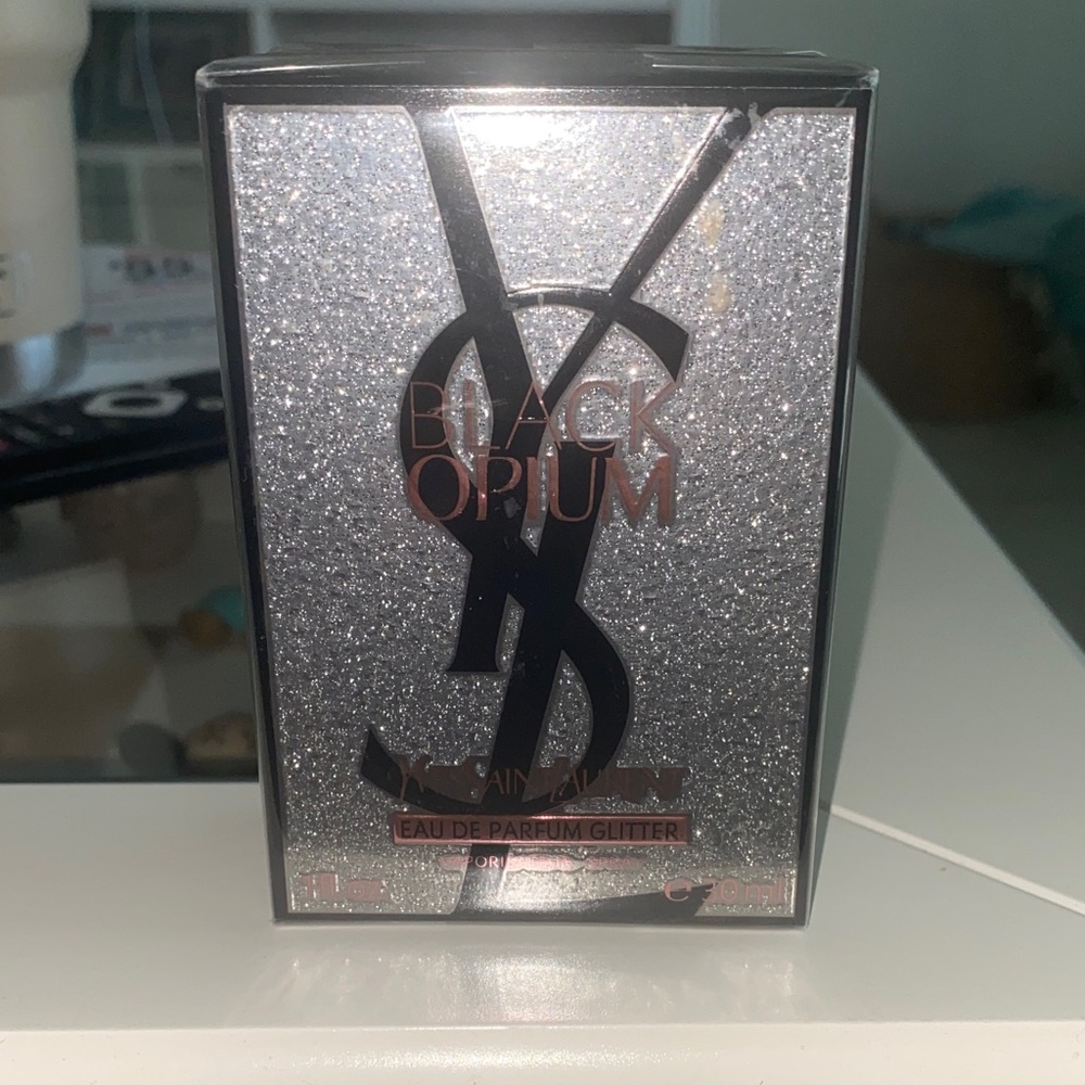 Yves Saint Laurent womens 1 oz Black Opium Glitter Brand new in sealed box.